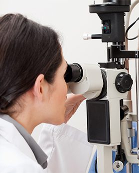 Old man in an eye exam